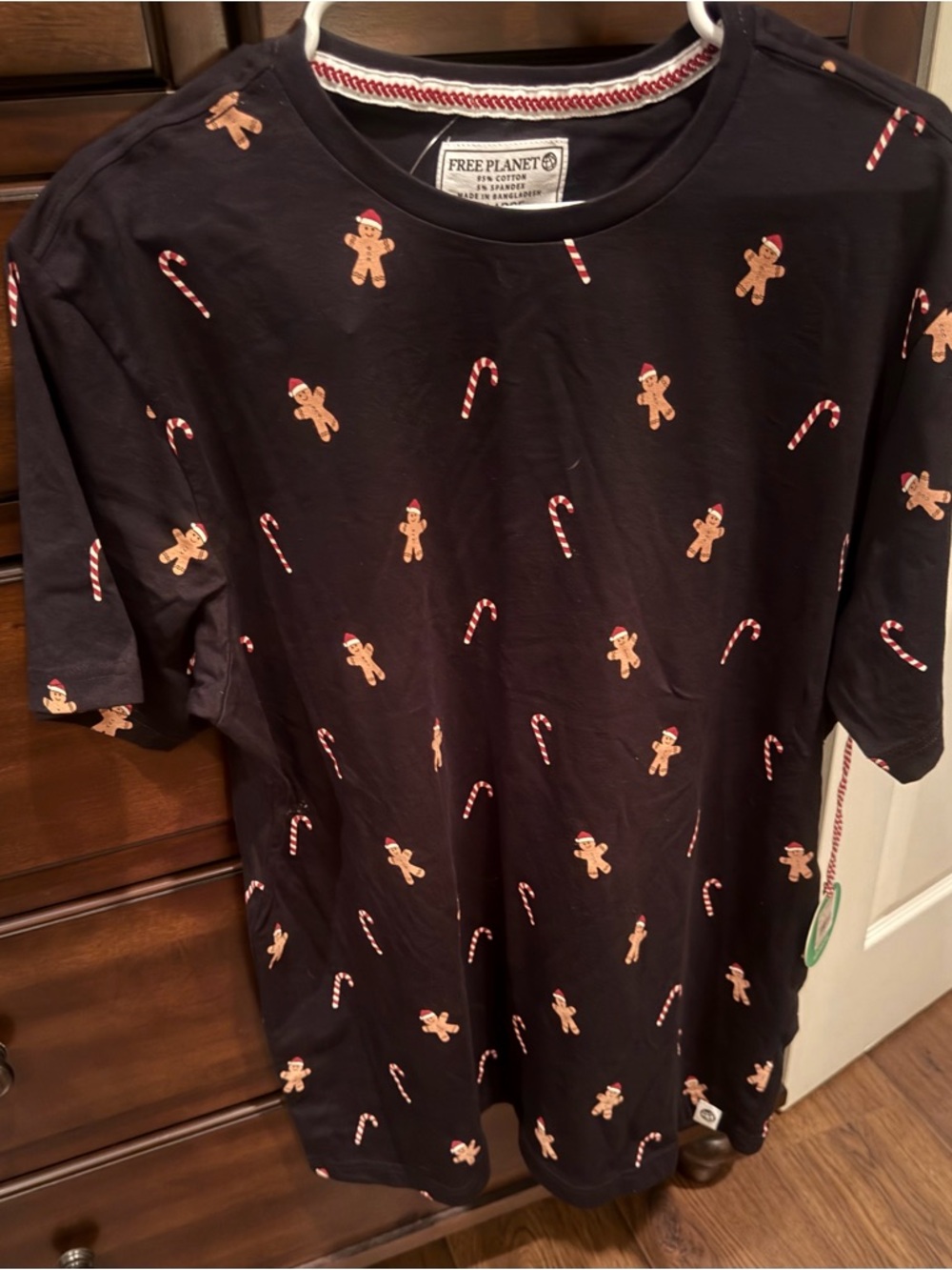 Free Planet Navy Tee with Red & White Candy Cane Accents